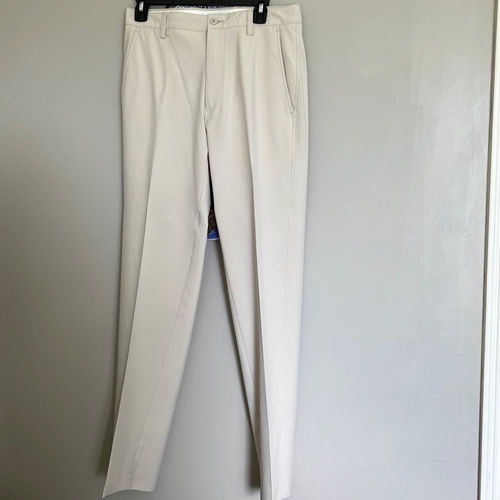 Footjoy mens pants with flat front and rear and side pockets in light stone.
